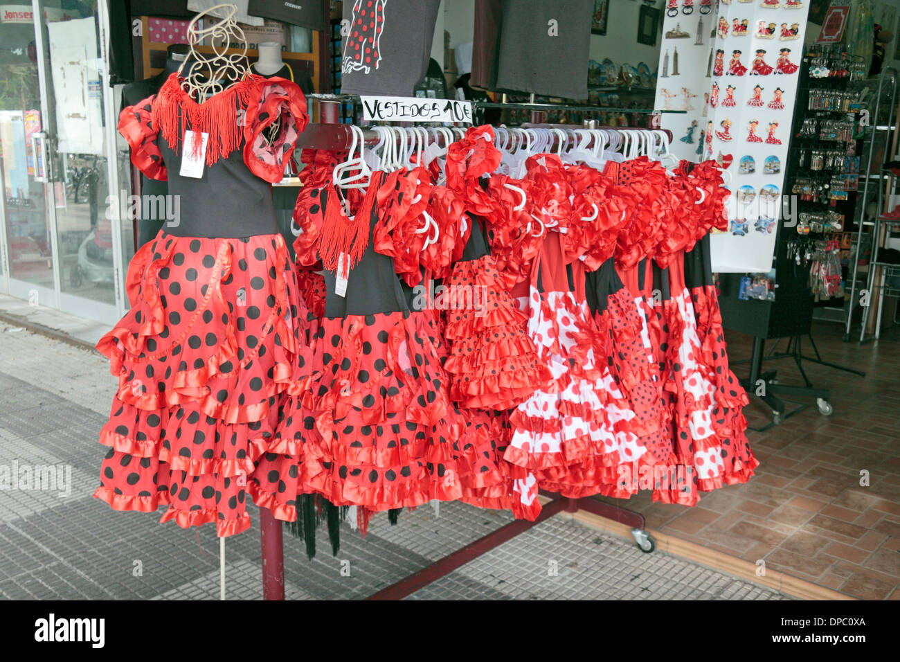 Flamenco dresses for children outside a tourist gift shop in Seville
