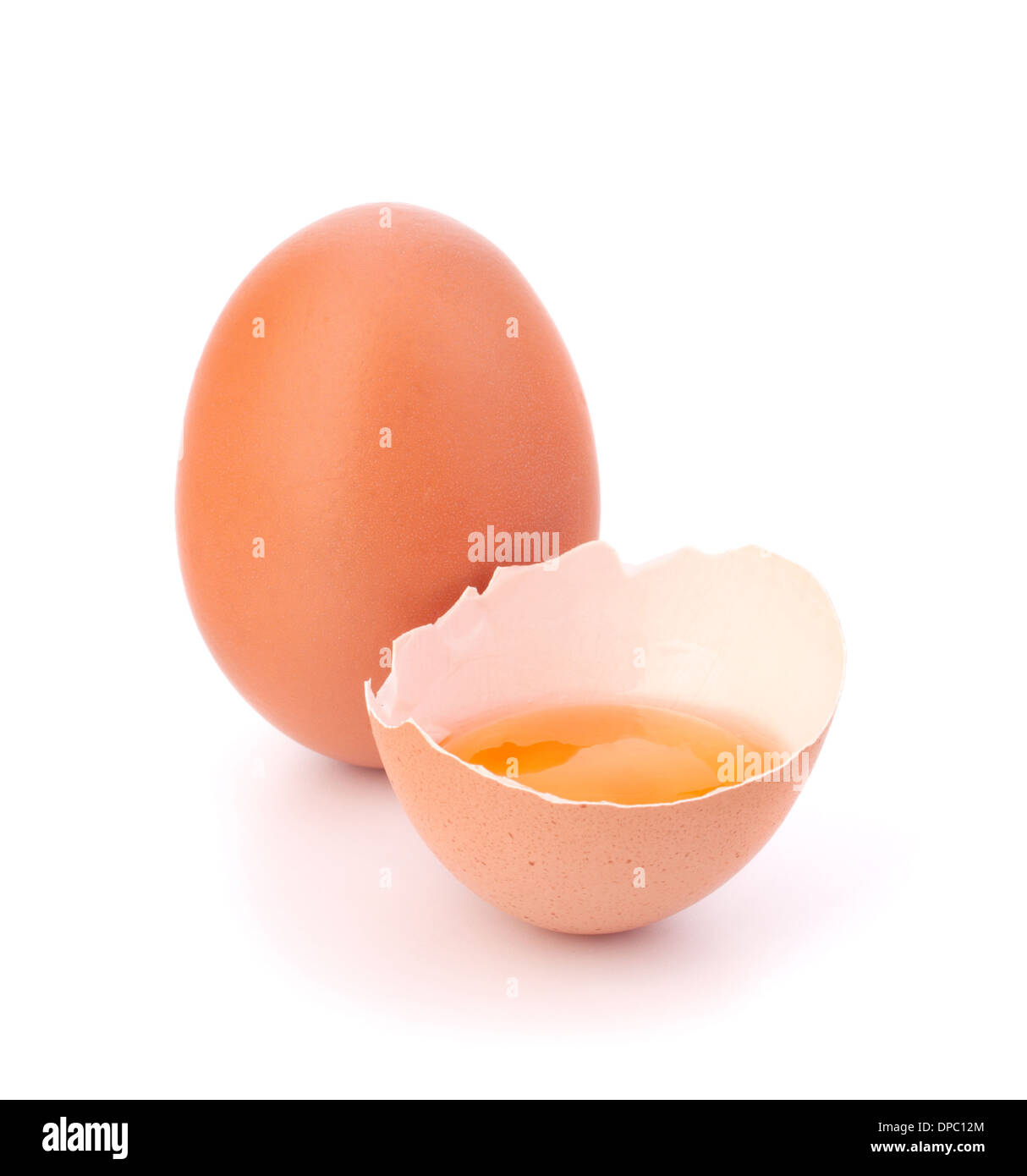 Broken egg isolated on white background Stock Photo - Alamy
