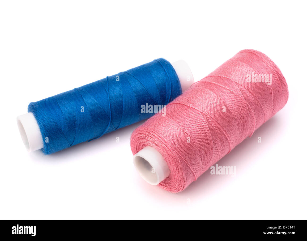 Colourful spools of thread isolated on white background Stock Photo - Alamy
