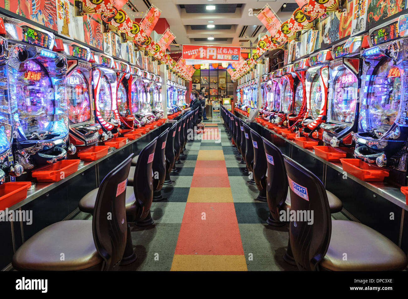 People gambling at a pachinko machine, Hiroshima, Japan, Asia. Stock Photo