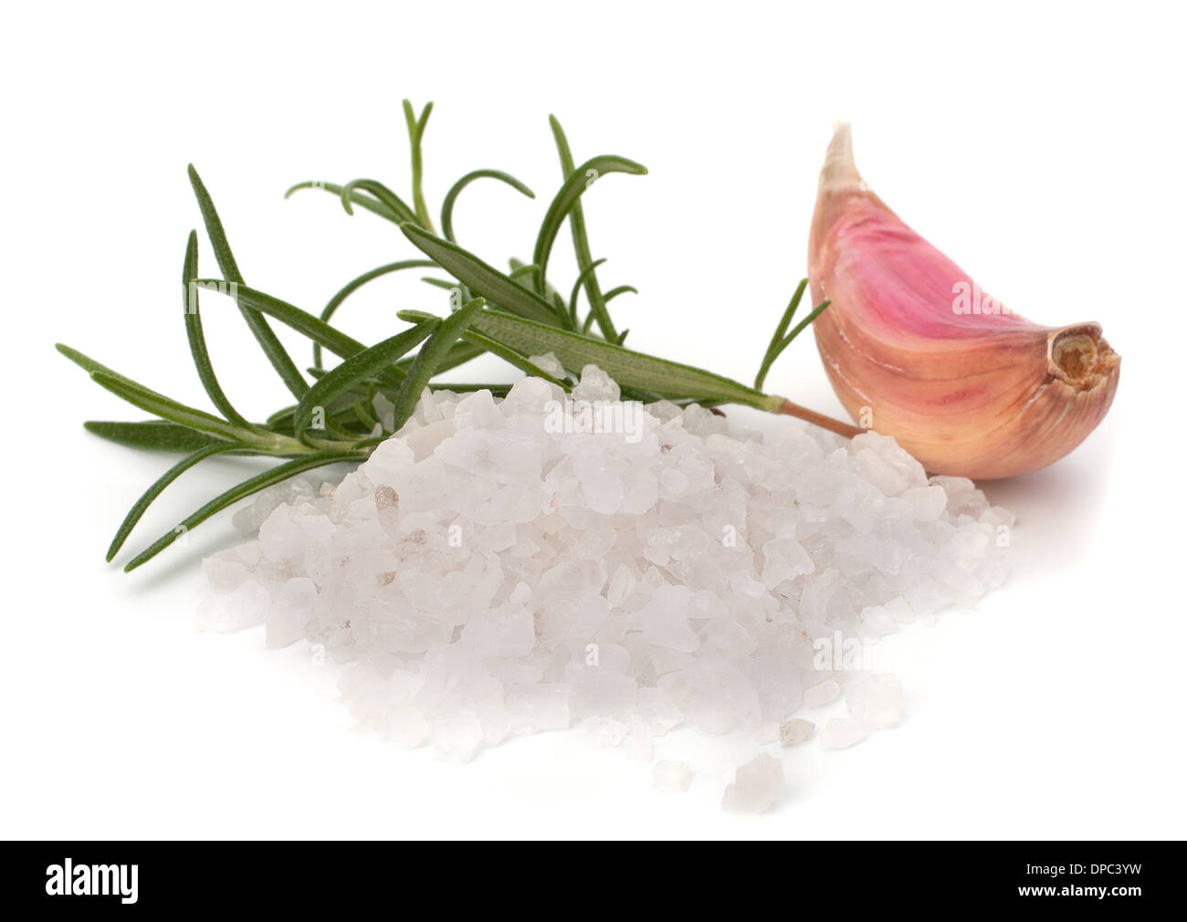 Salt pile and garlic clove isolated on white background Stock Photo - Alamy