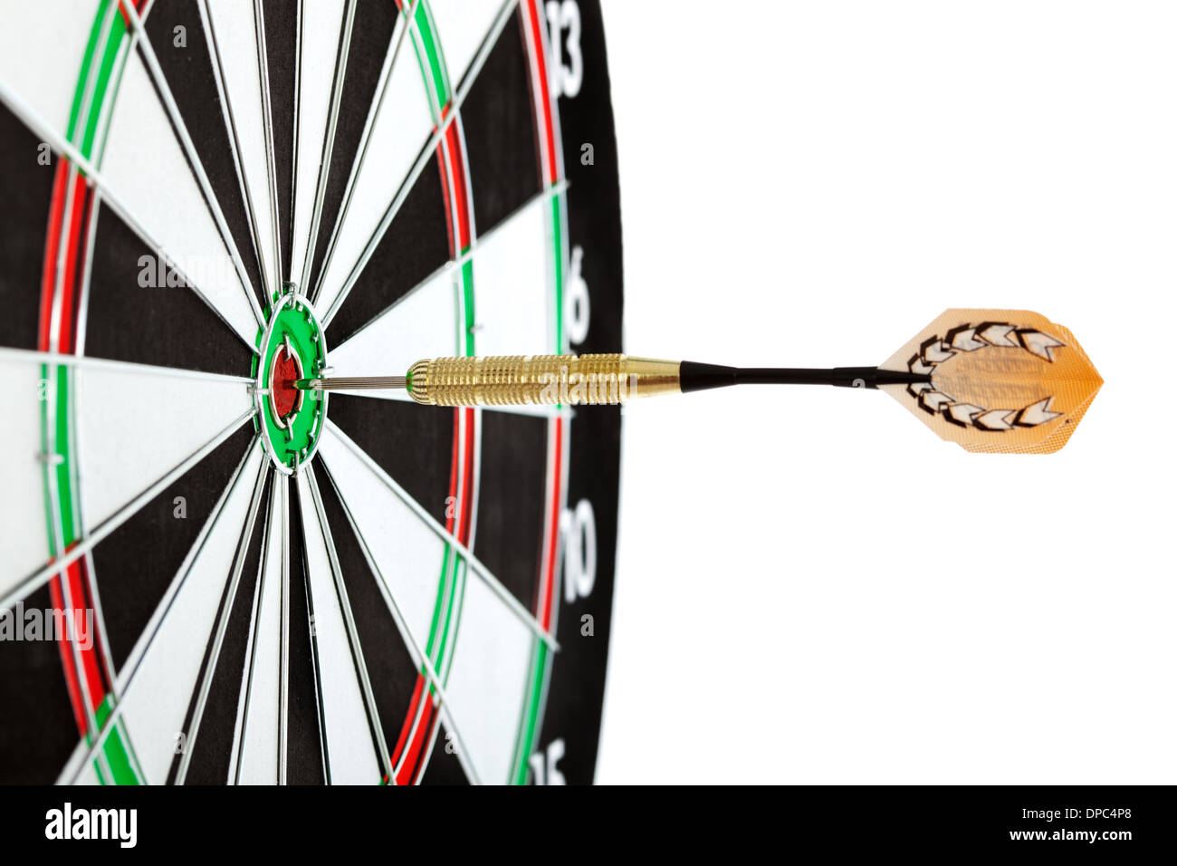 Bulls eye target with dart on white background Stock Photo