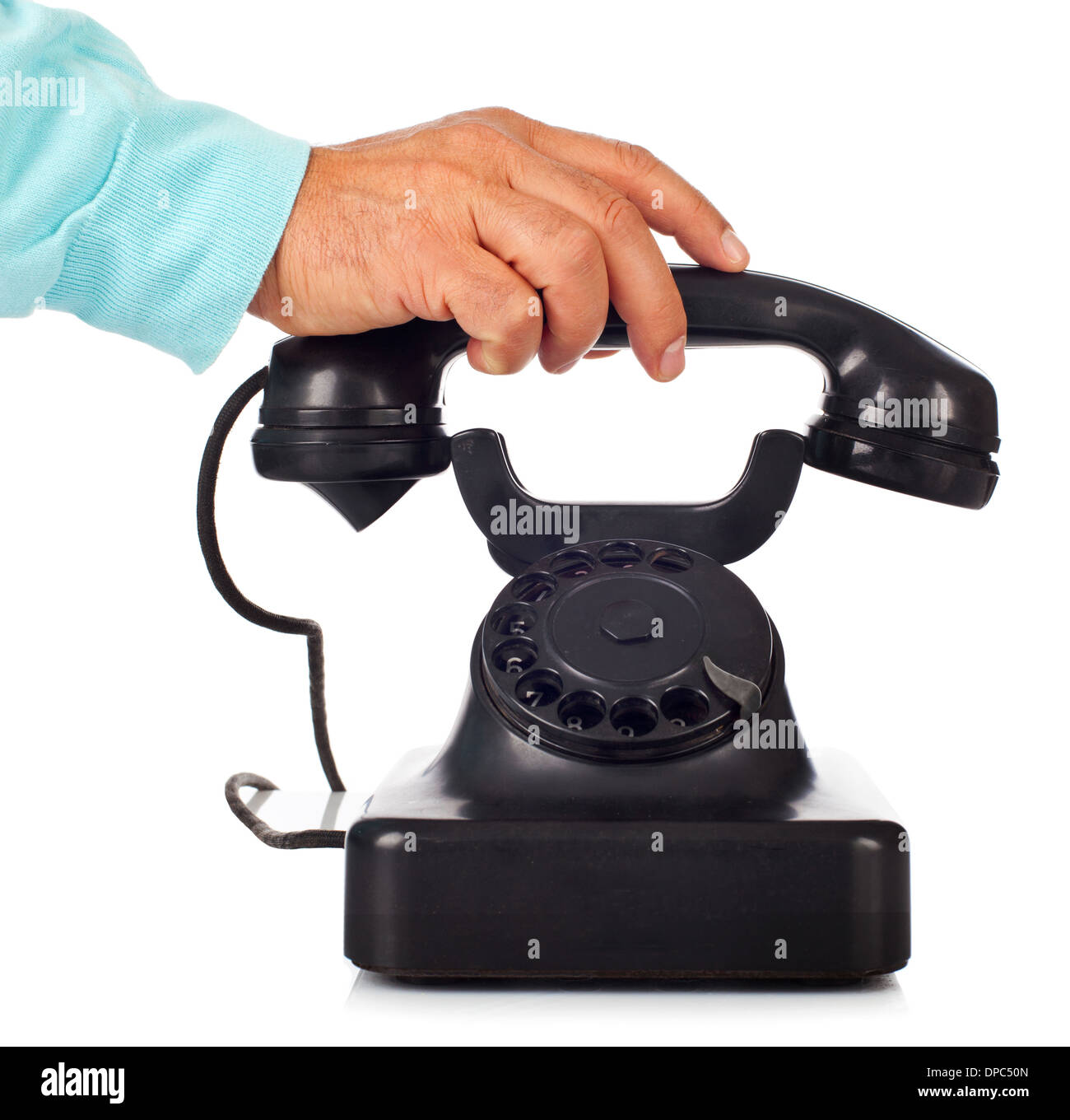 Old retro bakelite telephone on white background Stock Photo