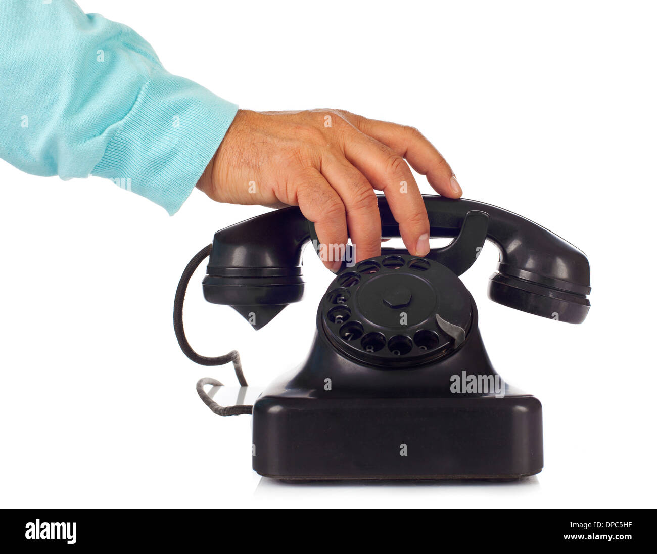 Old retro bakelite telephone on white background Stock Photo