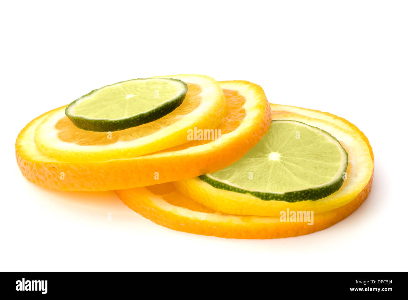 Citrus fruit slices isolated on white background Stock Photo - Alamy
