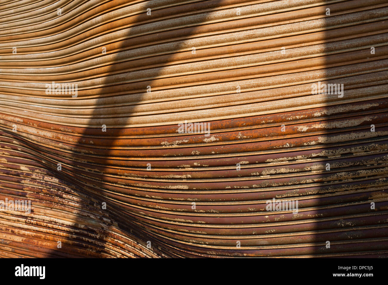 Warped burned rusted warehouse shutter doors Stock Photo