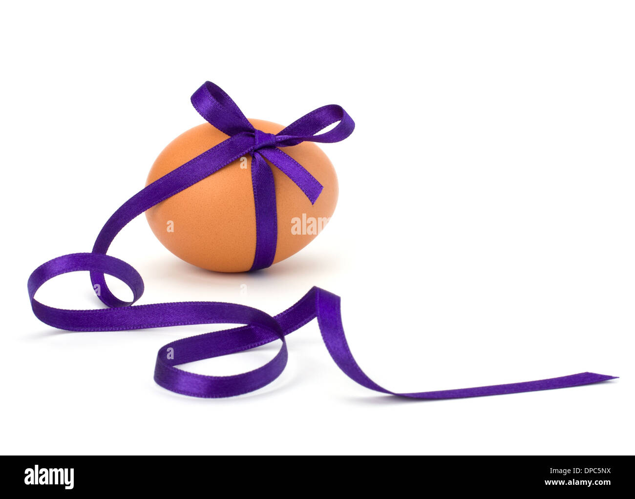 Easter egg with festive bow isolated on white background Stock Photo ...