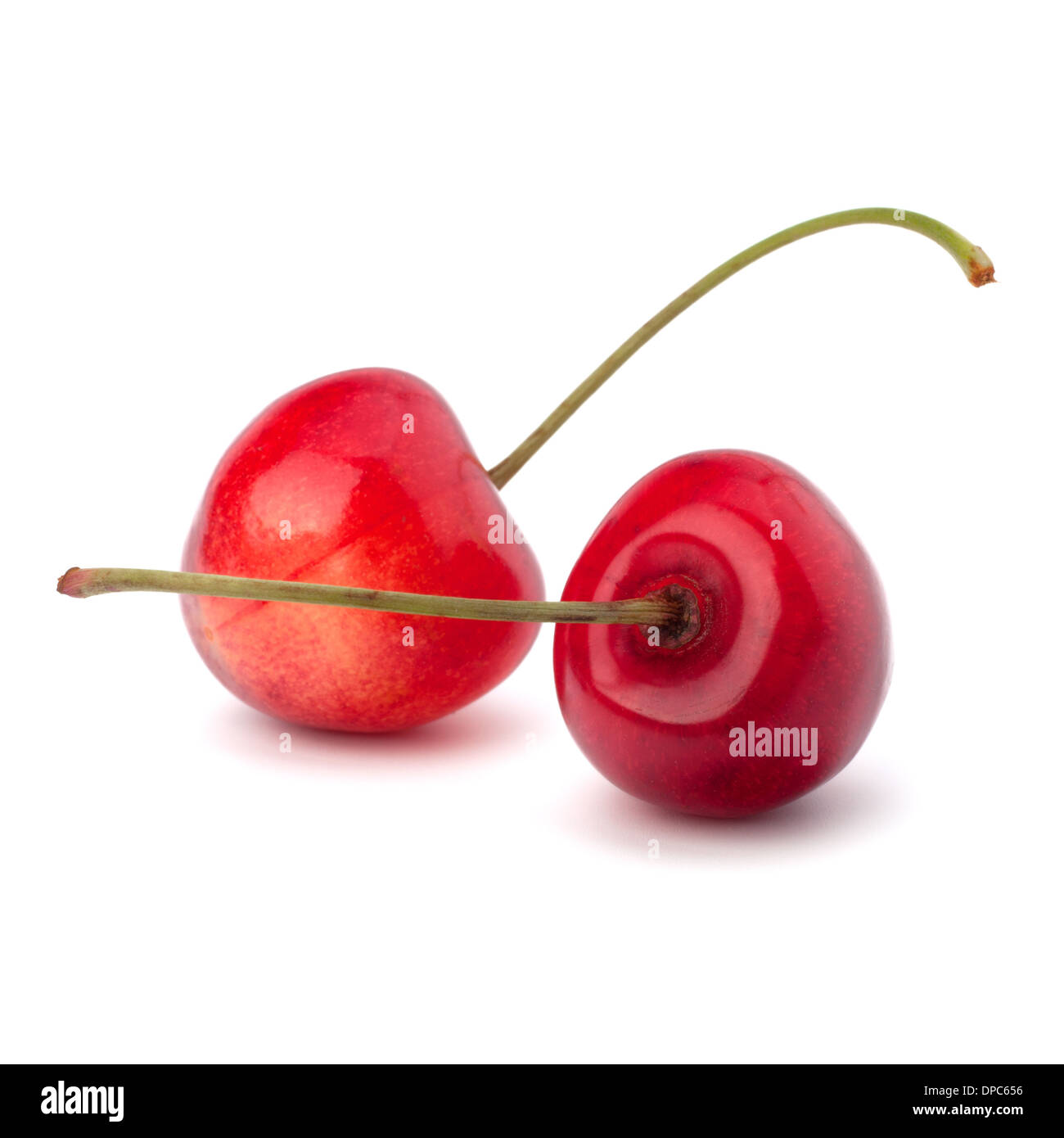 Two cherry berries isolated on white background Stock Photo - Alamy