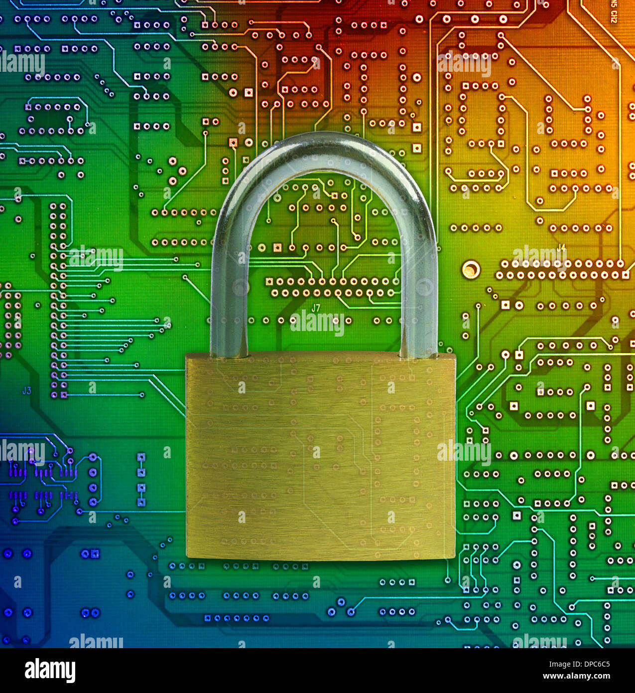 Closed lock on circuit background, security concept. Stock Photo