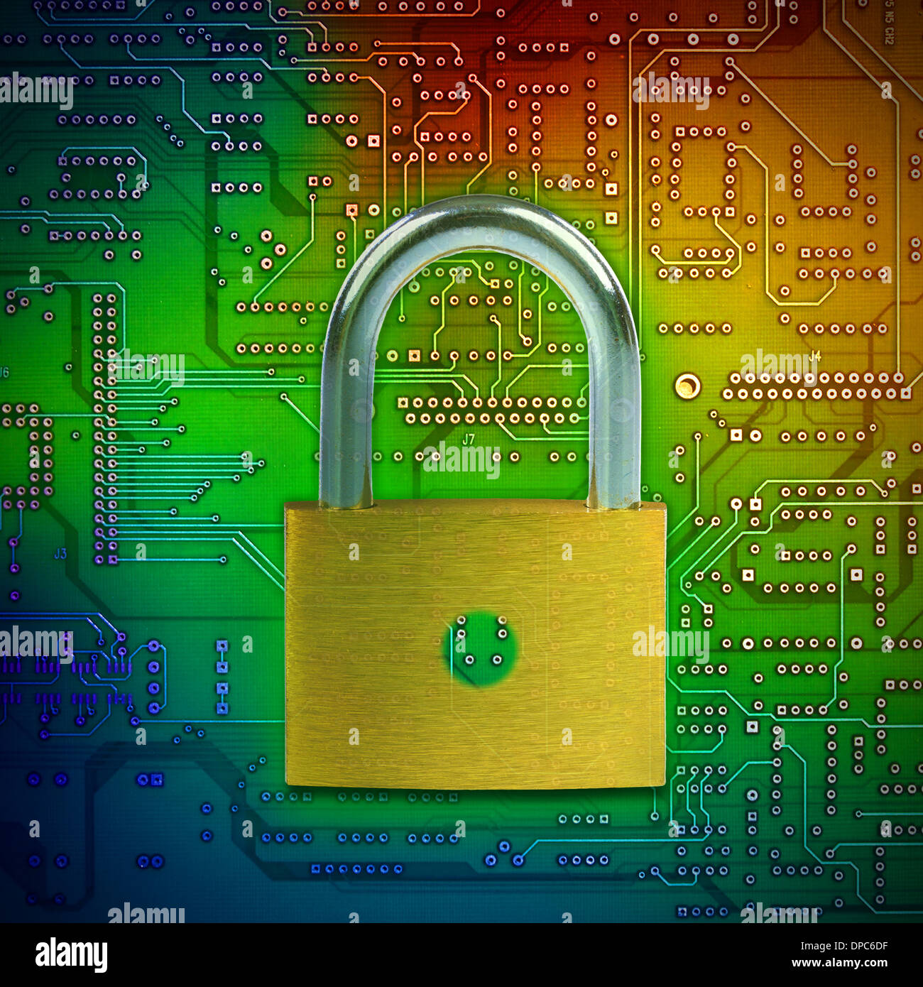 Closed lock on circuit background, security concept. Stock Photo