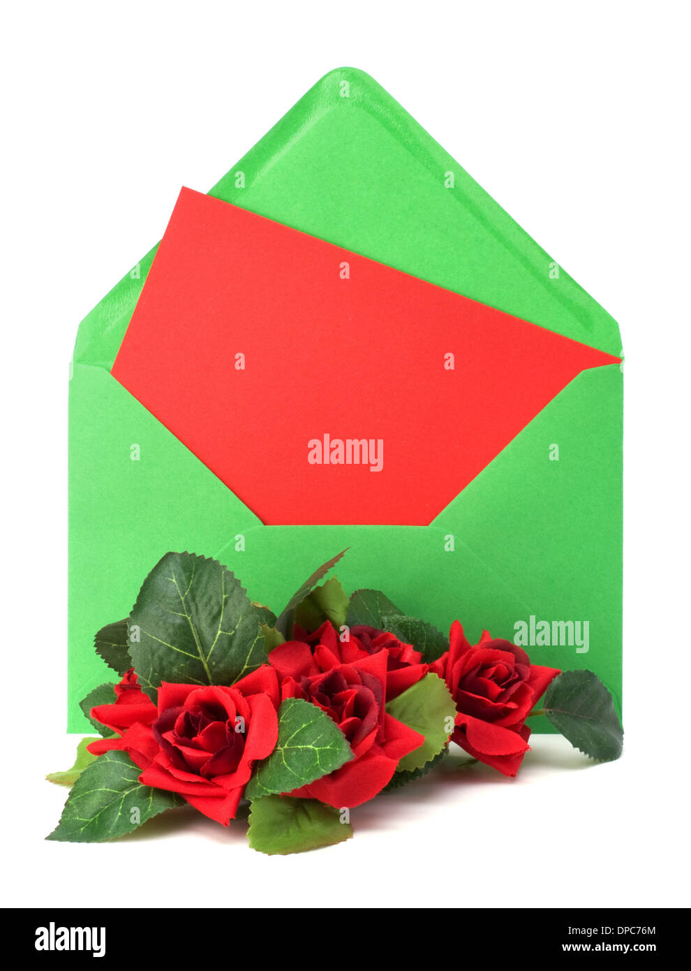 Envelope with floral decor. Flowers are artificial. Stock Photo