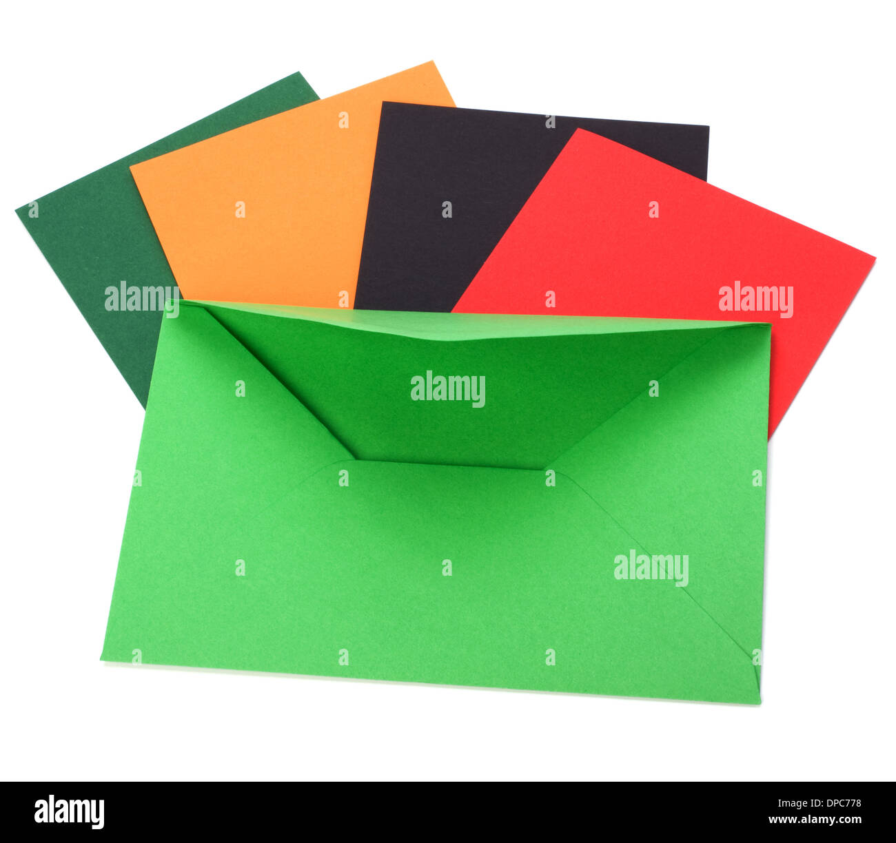 green envelope with cards isolated on white background Stock Photo