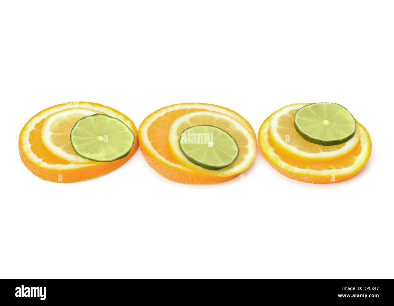 Citrus fruit slices isolated on white background Stock Photo - Alamy