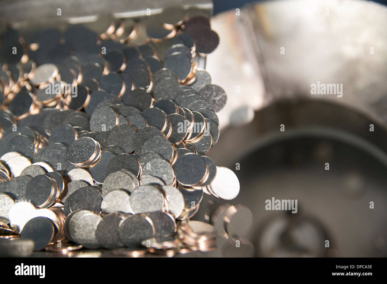 Quarter manufacturing at the Philadelphia branch of the United States Mint.  Stock Photo