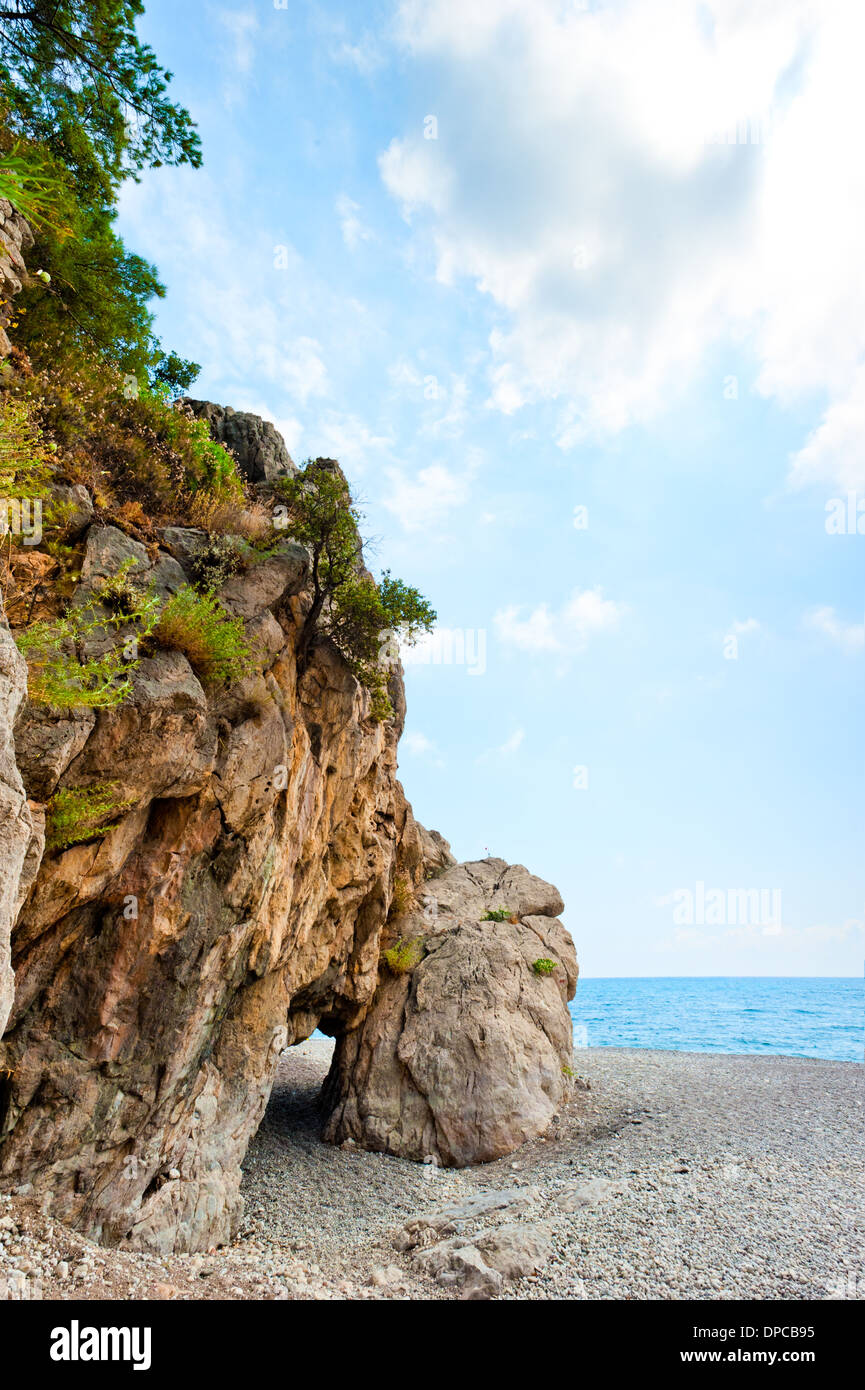 grotto in the rock on the sea beach Stock Photo - Alamy