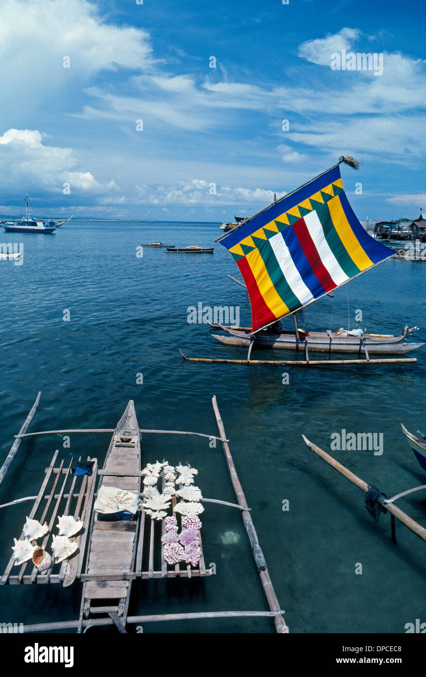 Colorful sails distinguish traditional Muslim outrigger boats, called