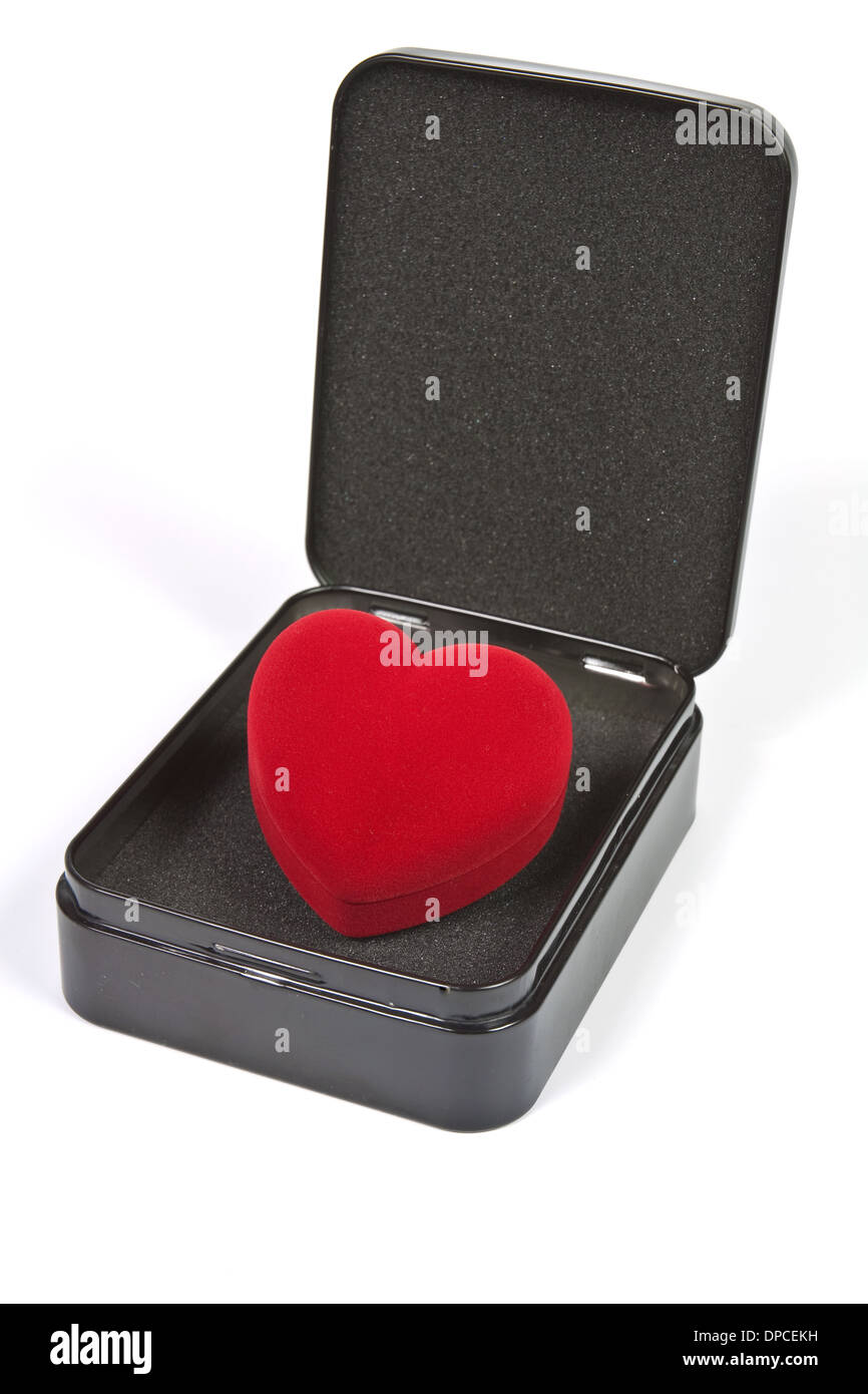 Plush red heart in a black metal box Stock Photo
