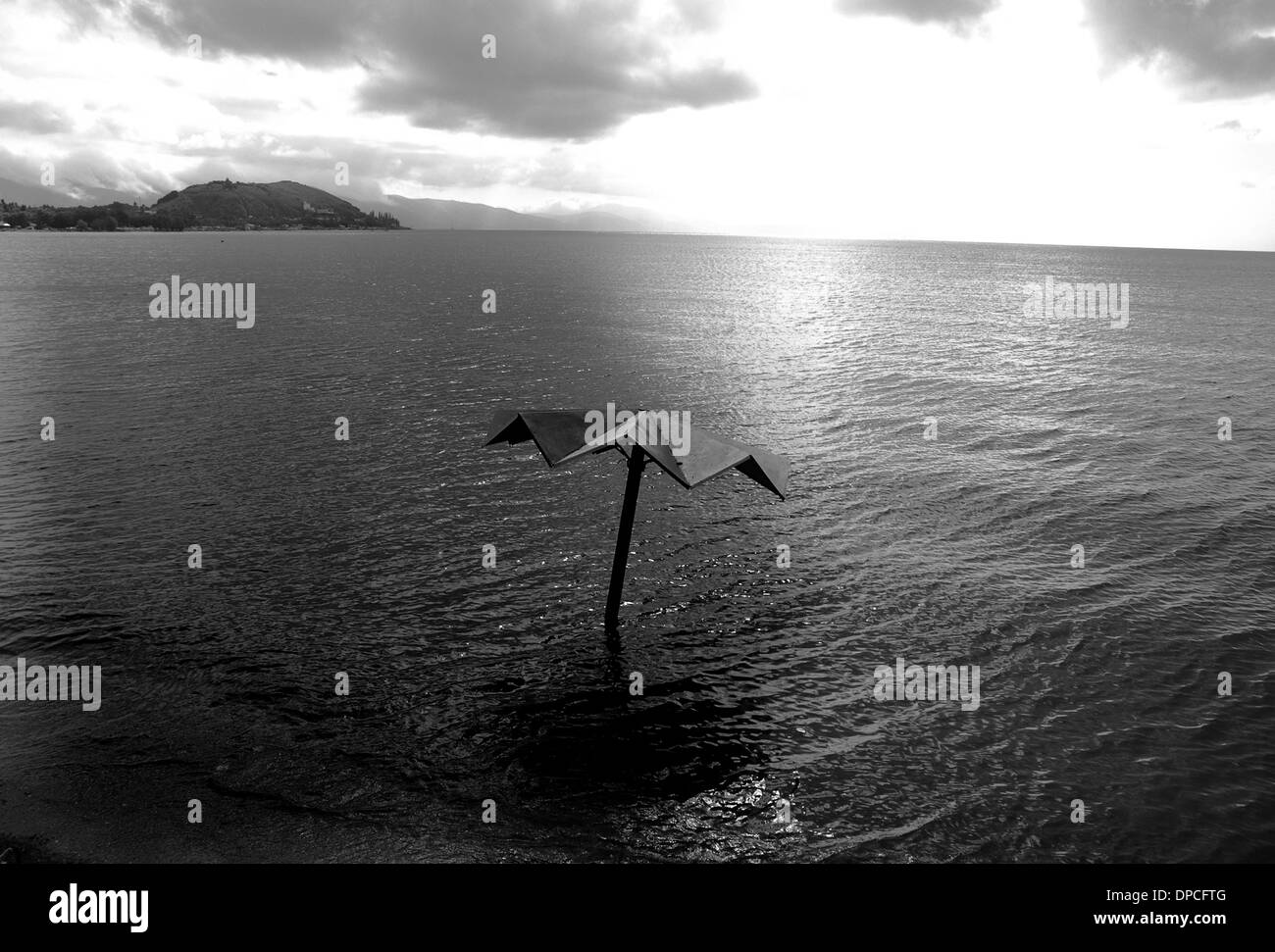 Lake Sevan Armenia.The beach umbrella appeared in the lake after