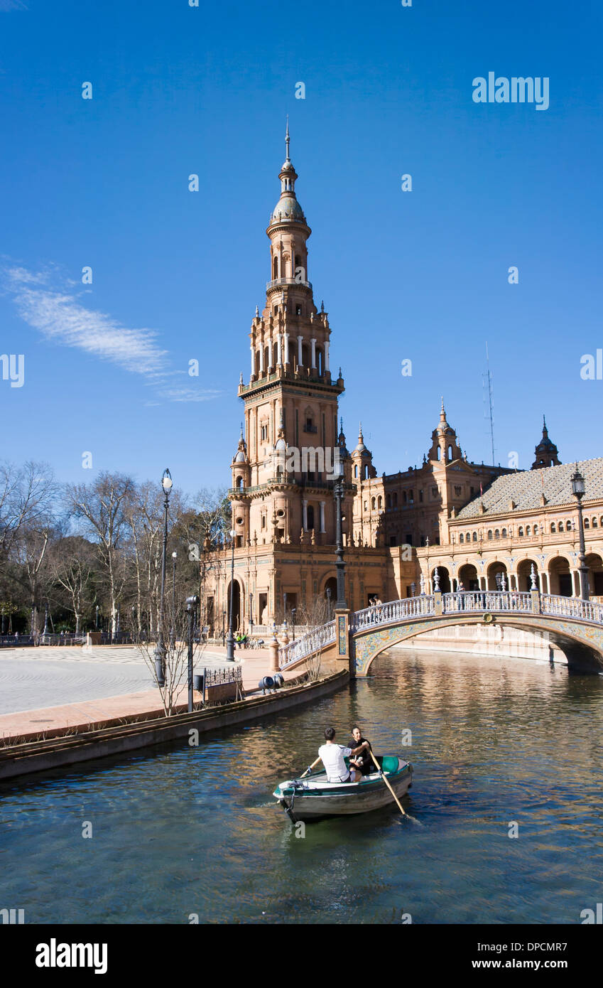 The Plaza de España, Parque de María Luisa, Seville, Spain. Couple in rowing boat. Stock Photo
