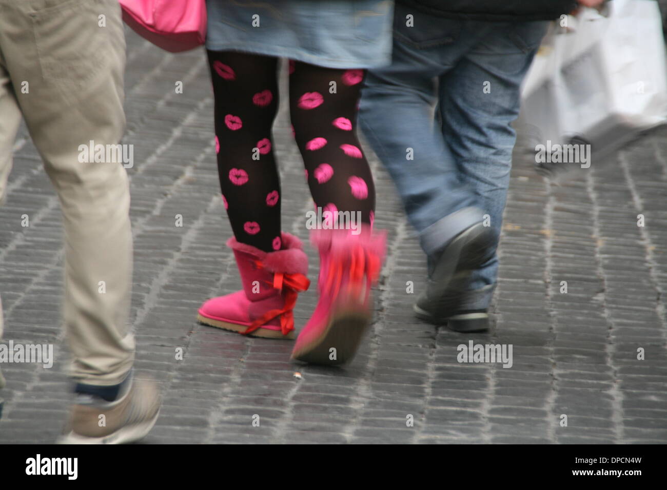 Woman wearing odd shoes hires stock photography and images Alamy