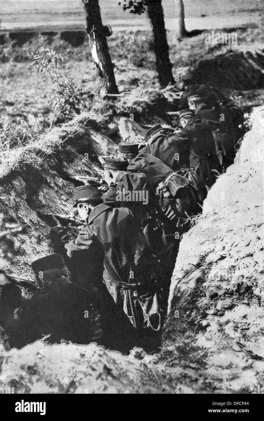 This photo shows Belgian soldiers in World War I in their trench rifle pits. Stock Photo