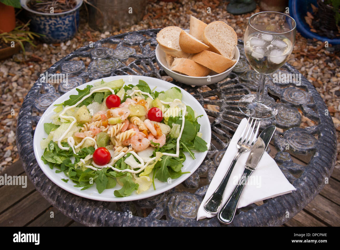 Fresh prawn melon kiwi and pasta salad Stock Photo