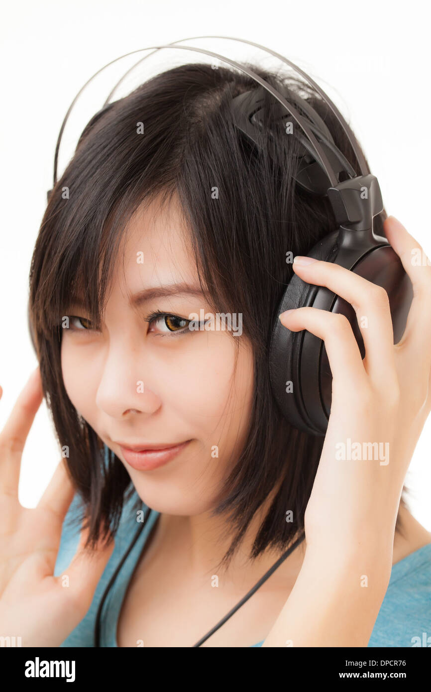 Young Asian woman with a audiophile Headphone Stock Photo - Alamy