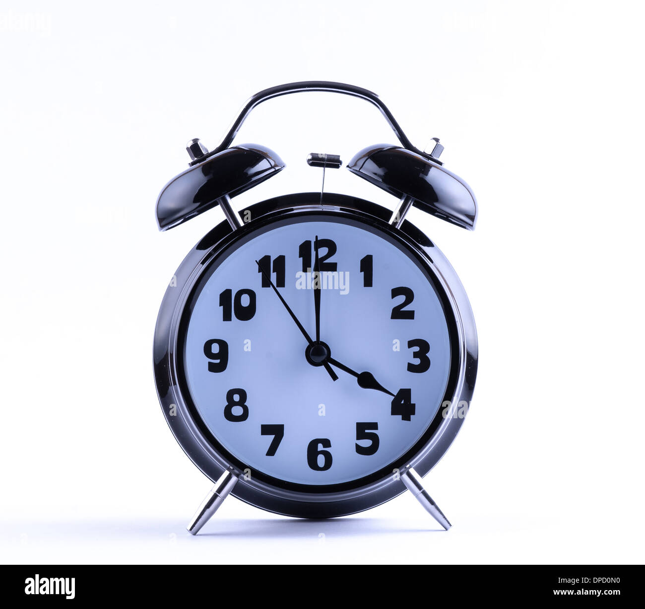 Alram clock on white background with four o'clock Stock Photo Alamy