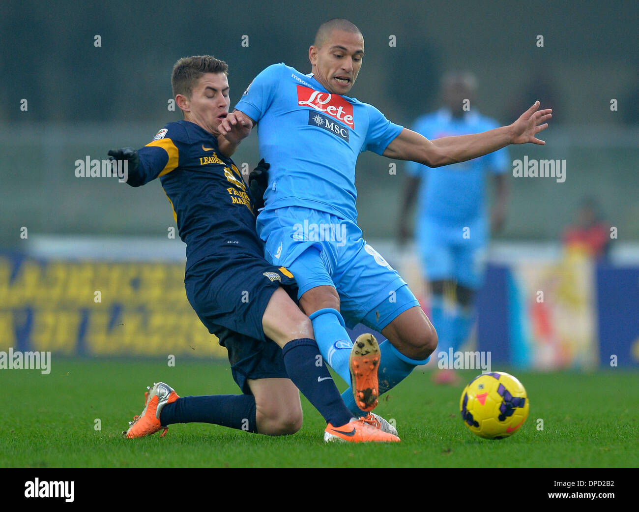 Verona, Italy. 12th Jan, 2014. Naples' Gokhan Inler (R) competes during the Serie A football match Hellas Verona vs SSC Napoli in Verona, Italy, on Jan. 12, 2014. SSC Napoli won 3-0. Credit:  Alberto Lingria/Xinhua/Alamy Live News Stock Photo