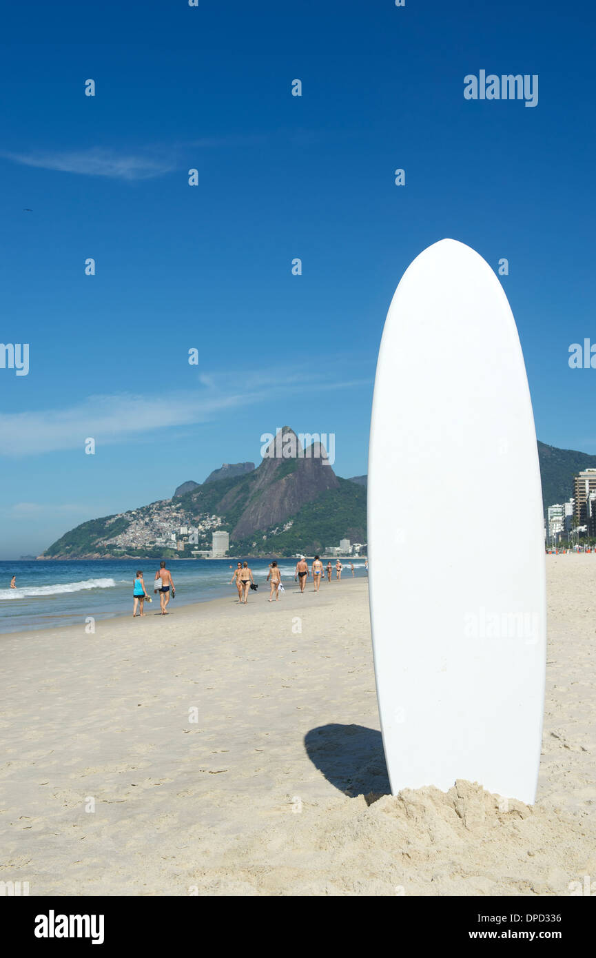 Stand up paddle surfboard standing on the beach at Ipanema, Rio de Janeiro Brazil Stock Photo
