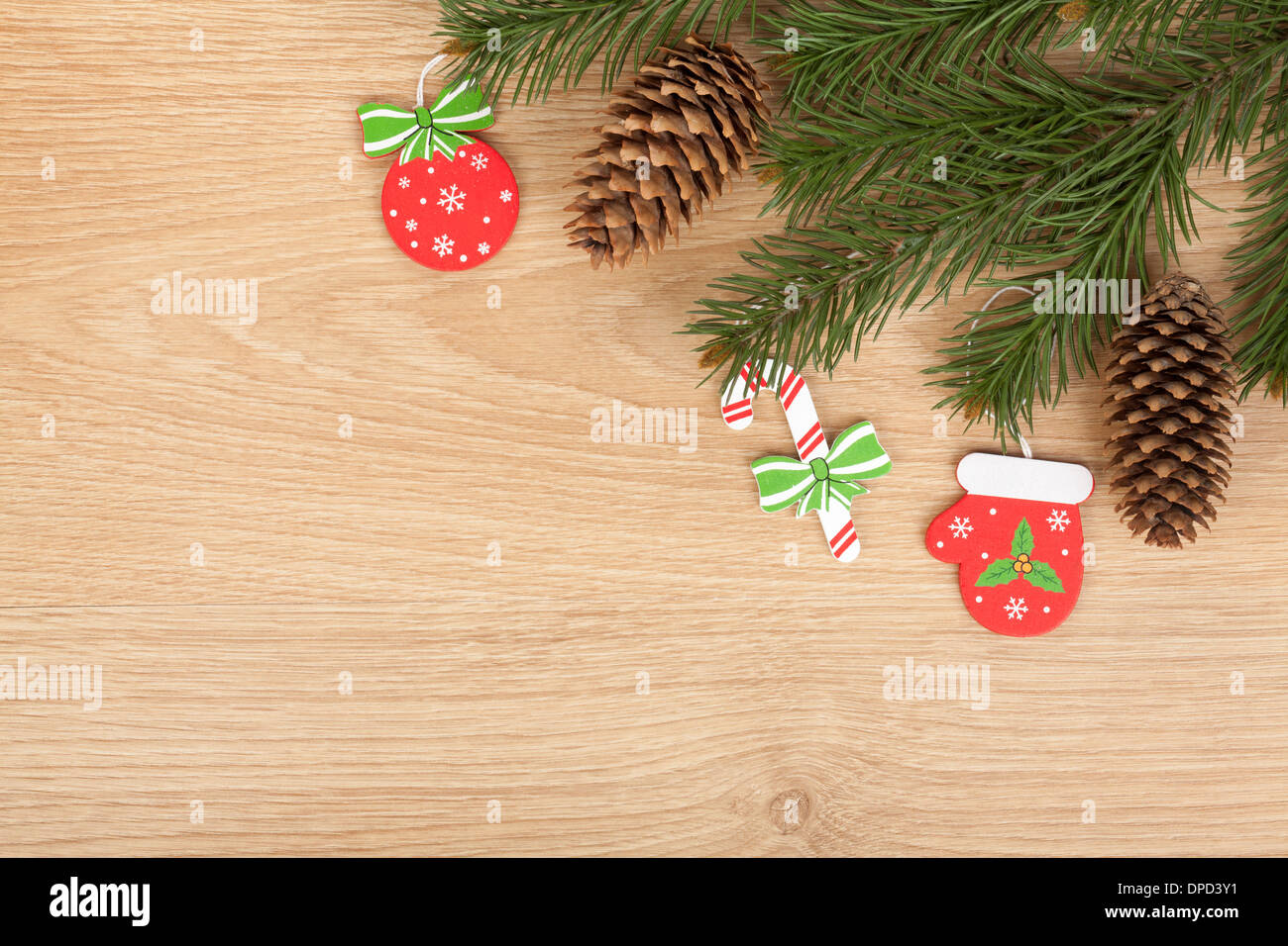Christmas fir tree and decor on wooden board Stock Photo - Alamy