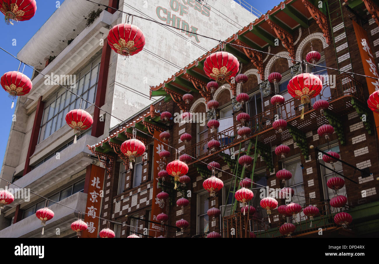 Red Chinese Lanterns over San Francisco's Chinatown next to the Empress of China restaurant Stock Photo