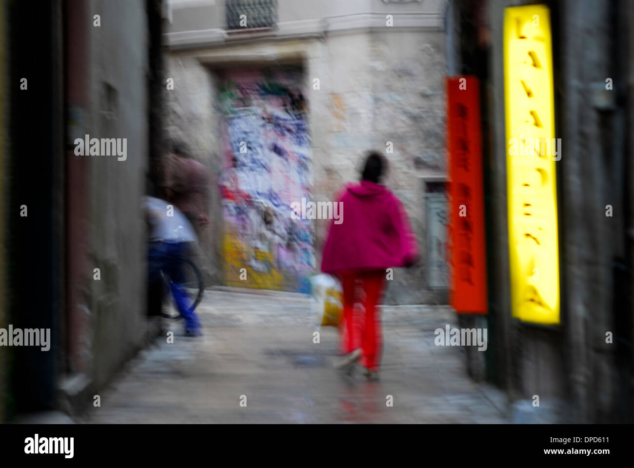 Child running in alley in Old City Barcelona Stock Photo Alamy