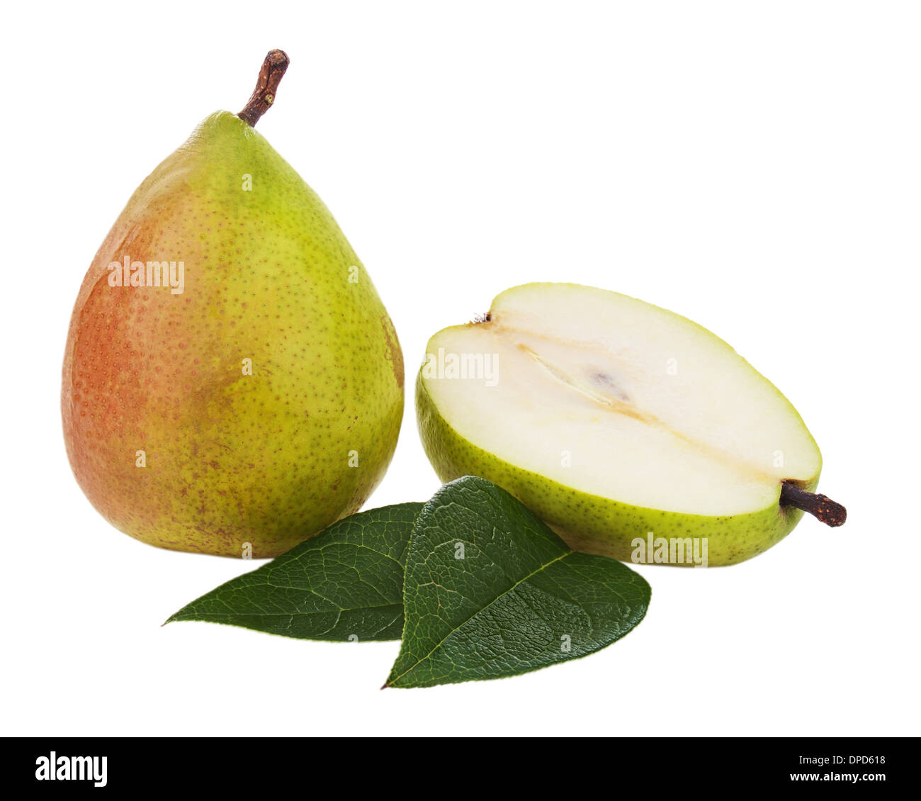 Ripe pear with cut and green leaves isolated on white background ...