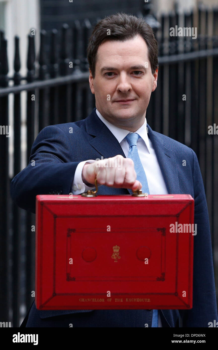 Britain's Chancellor of the Excheguer (Minister of Finance) George Osborne holds aloft his red despatch box as he leaves his off Stock Photo