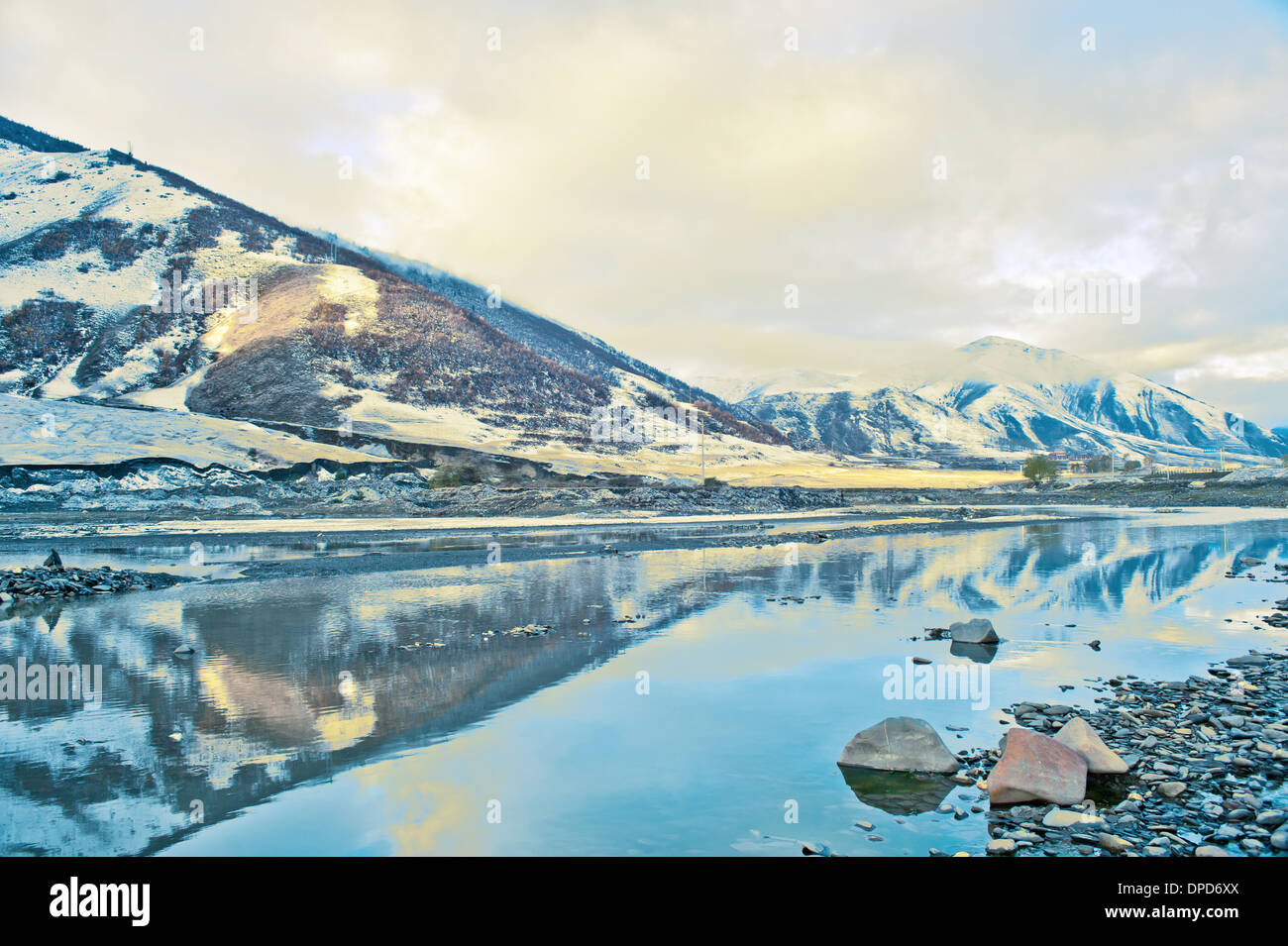 China's Tibet highway snow under the car background Stock Photo