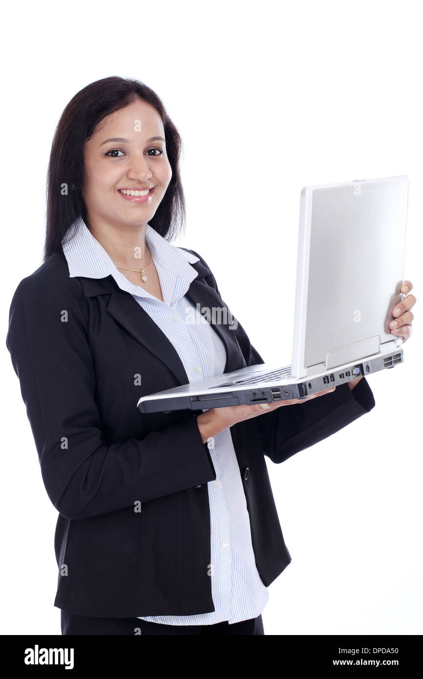 Attractive young Indian business woman with laptop against white Stock Photo