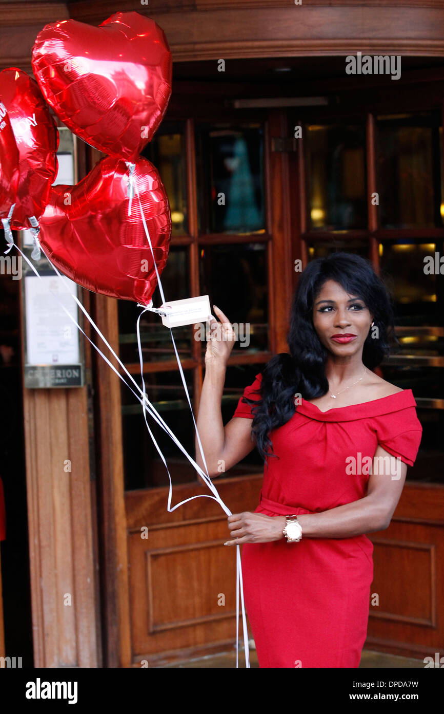 British-American singer Sinitta poses with red balloons for a photograph during a Love London Day Valentine's Day Stock Photo