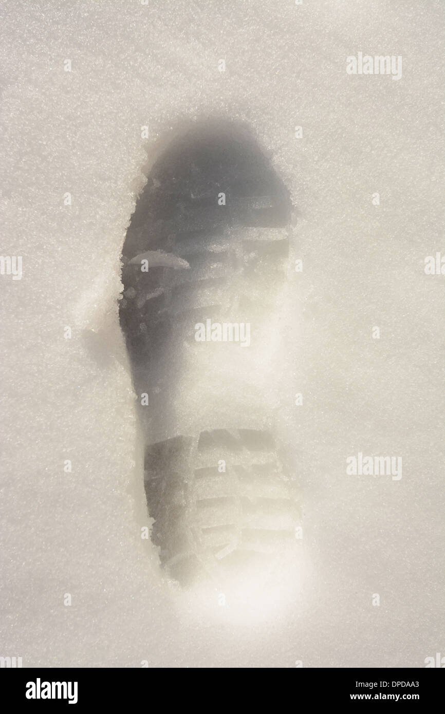 Shoe Print in the Snow Stock Photo