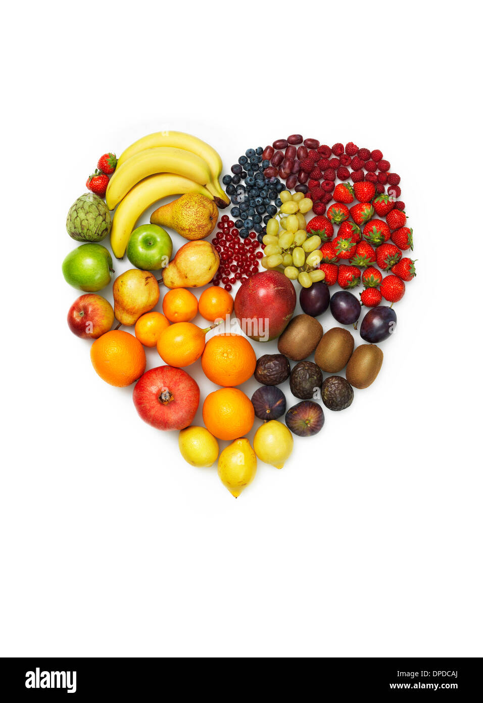 Variety of vegetables and fruits on white background, heart shape Stock