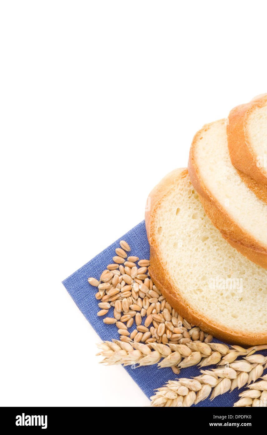 sliced bread and ears of wheat isolated on white background Stock Photo ...