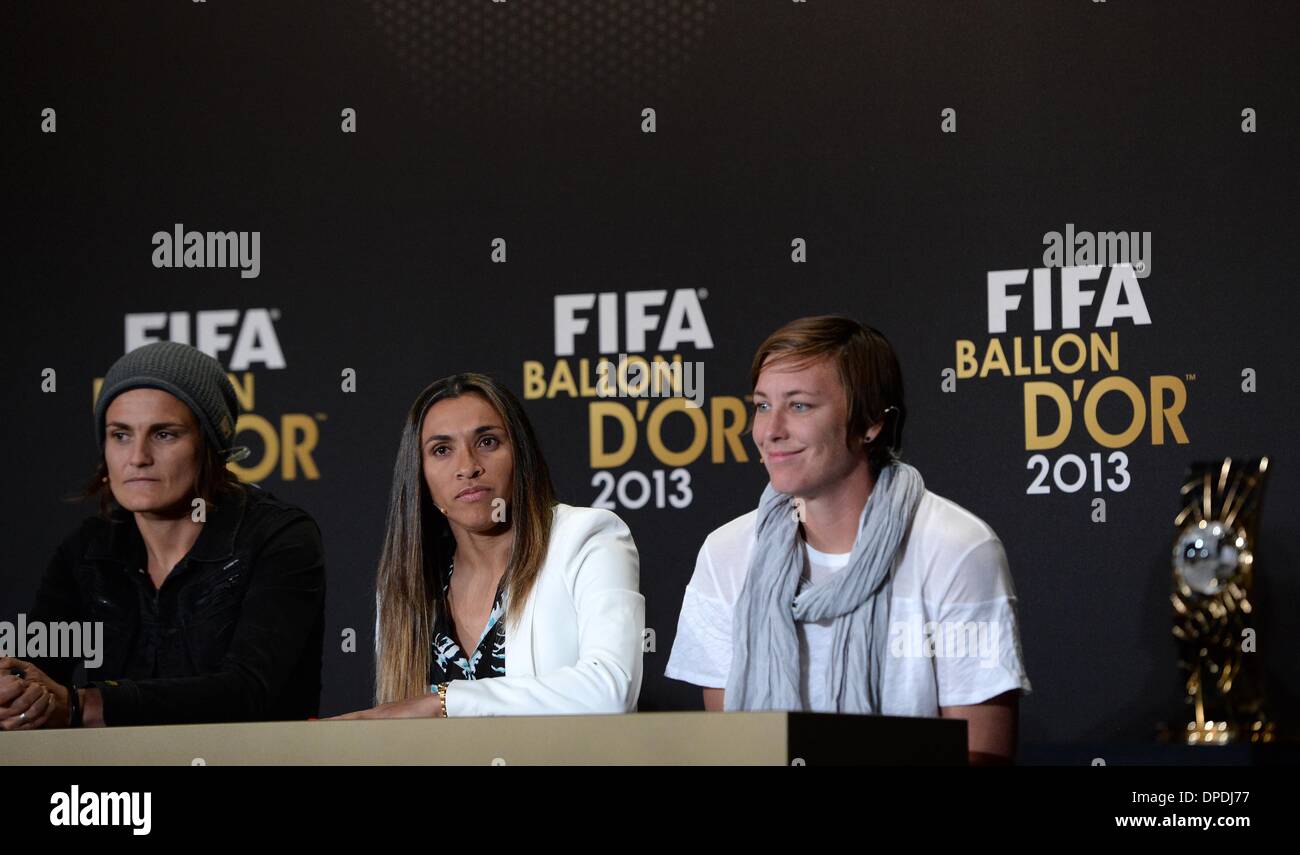 Zurich, Switzerland. 13th Jan, 2014. Nominees for the 2013 FIFA Womens' Player of the Year, German's goalkeeper Nadine Angerer, Brazil's football star Marta and U.S. football star Abby Wambach (From L to R), attend a press conference ahead of Ballon d'Or award ceremony in Zurich, Switzerland, on Jan. 13, 2014. Credit:  Wang Siwei/Xinhua/Alamy Live News Stock Photo
