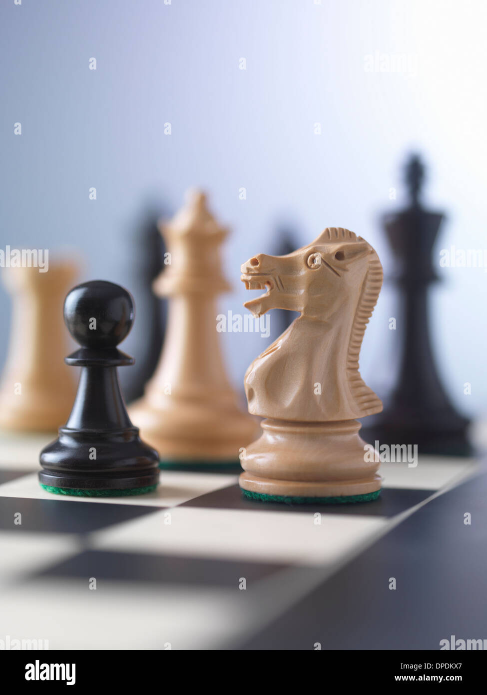 Chess game, player preparing to check mate Stock Photo