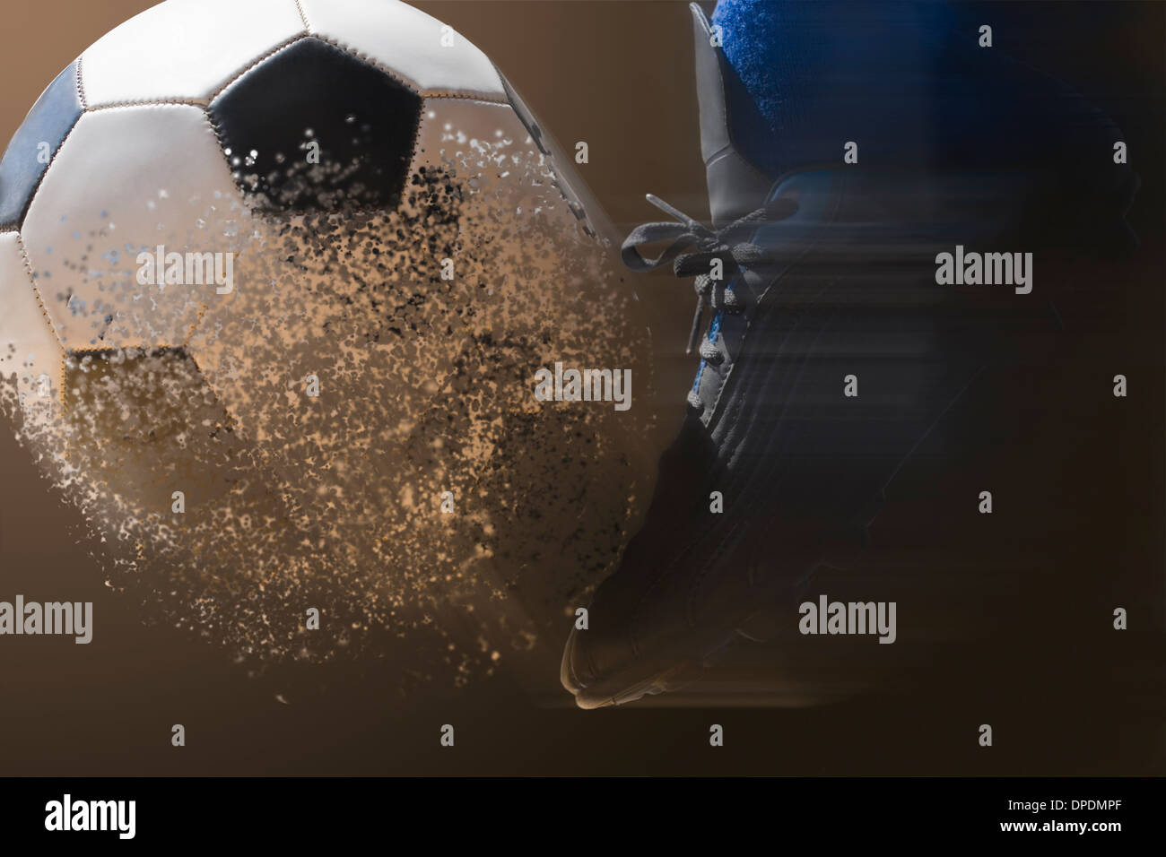 Close up soccer player and football with blurred motion Stock Photo