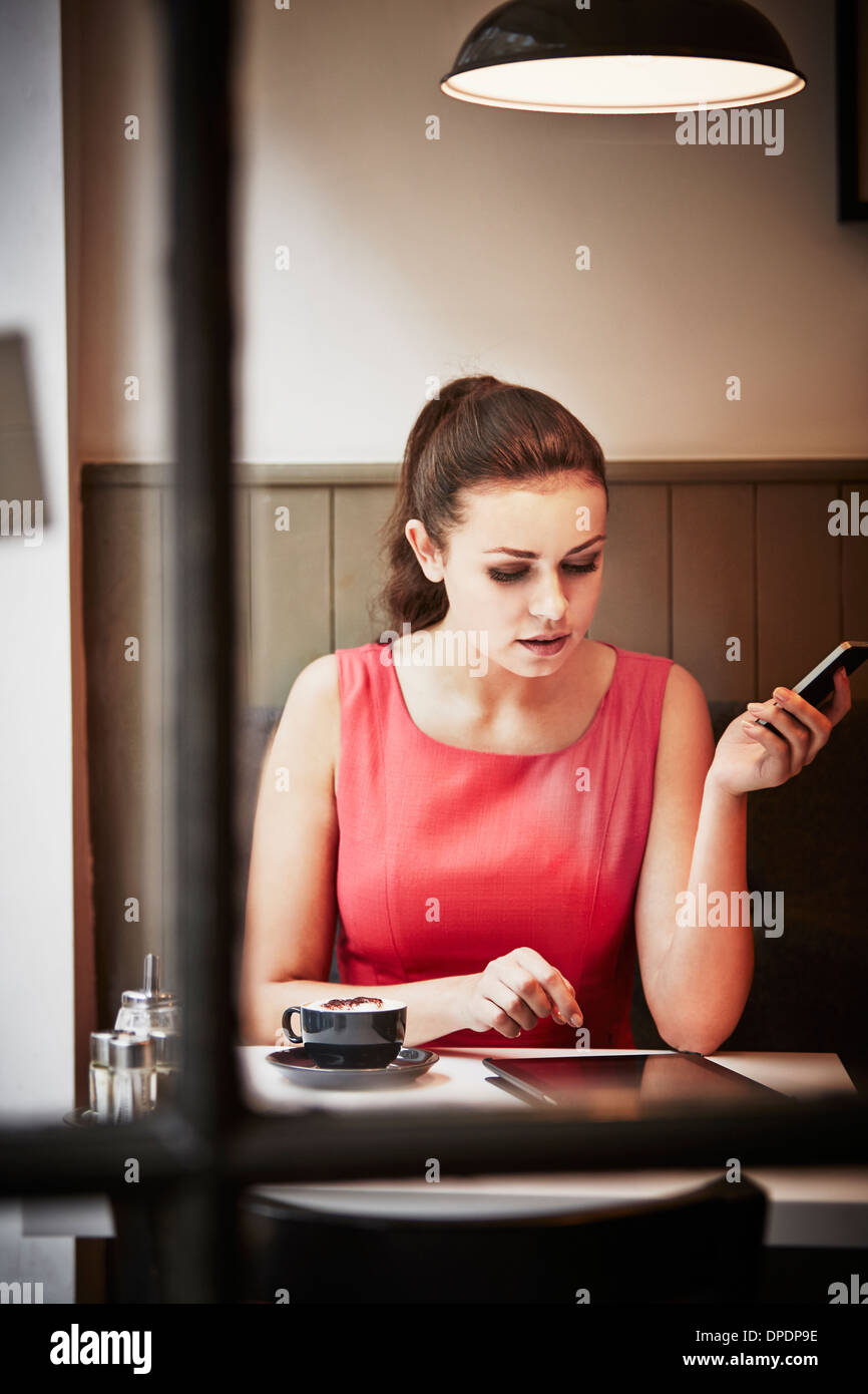 Woman in a cafe with tablet hi-res stock photography and images - Alamy