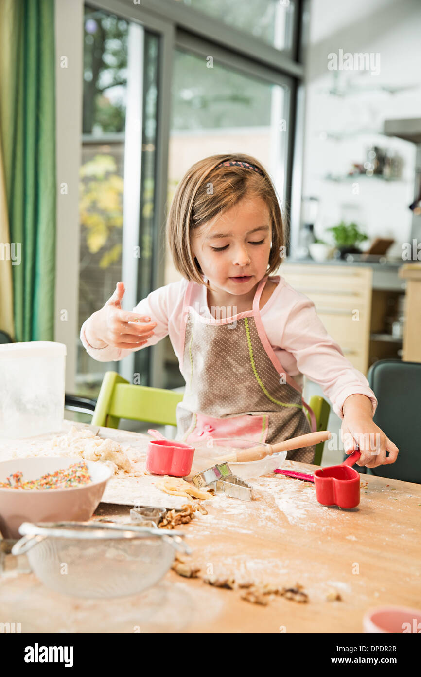 Girl baking in kitchen Stock Photo Alamy