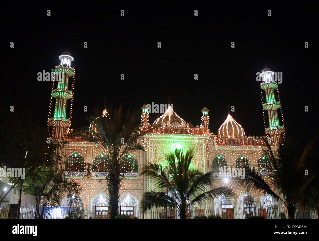 A beautiful illuminated view of Aram Bagh Mosque decorated with lights in connection of 12th Rabi-ul-Awwal the Birthday Ceremony of Holy Prophet (P.B.U.H), in Karachi on Monday, January 13, 2014. Stock Photo