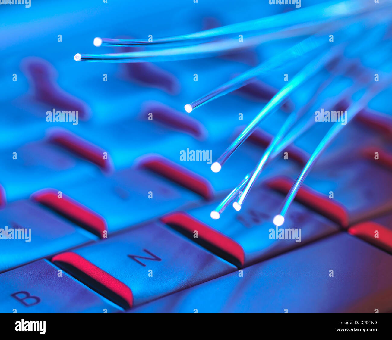 Computer key board with optical fibres which are used to carry images