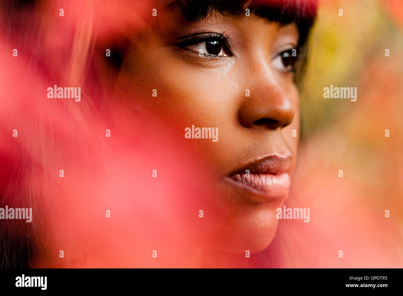 Close up portrait of thoughtful young woman Stock Photo