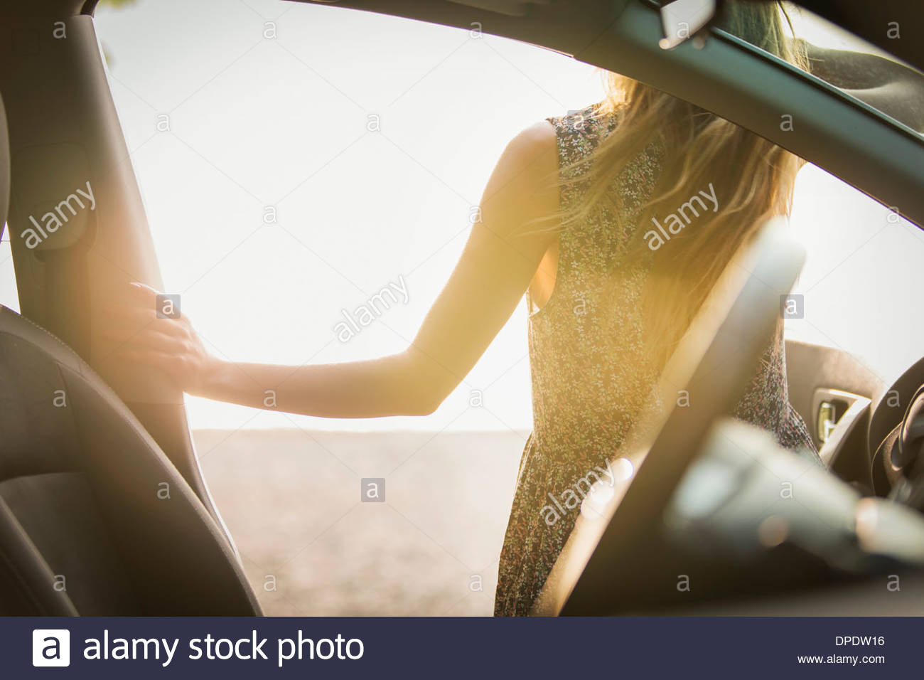 Woman Getting Out Of Car High Resolution Stock Photography and Images